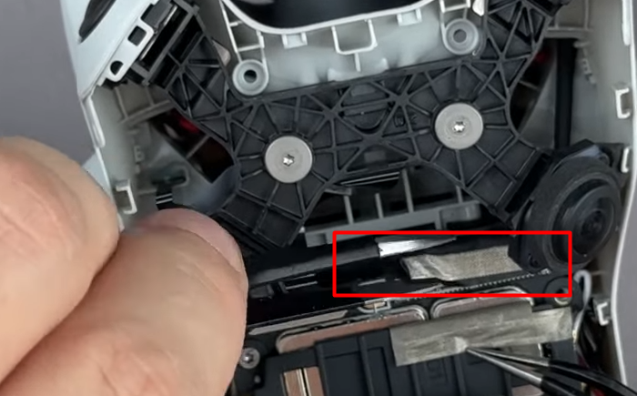 Unscrew it, then use tweezers to peel off the adhesive pad.